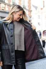 Black buttoned leather jacket with a clean-cut look - Image n°4