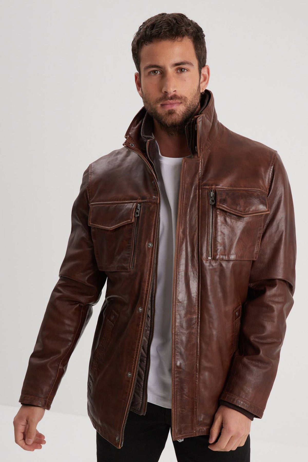 Mid-length bison sheepskin leather jacket, elegant and functional. - Image n°1