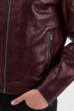Burgundy leather motorcycle jacket. - Image n°4