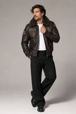 Brown leather flight jacket with aviation patches - Image n°1