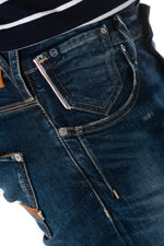 Raw blue jeans faded and with holes - Image n°5