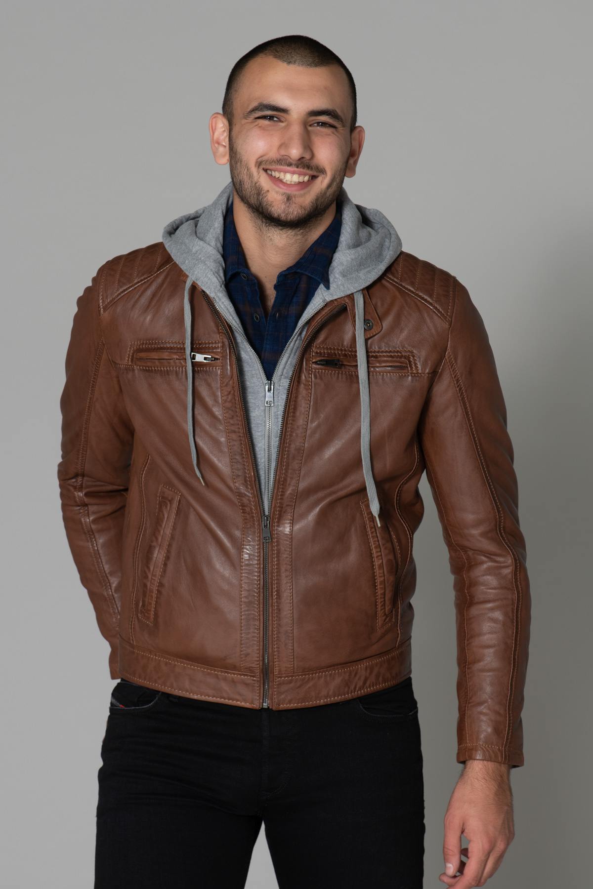 Leather jacket with facing and hood - Image n°1