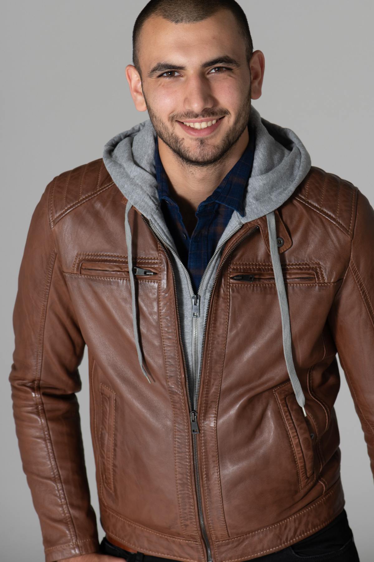Leather jacket with facing and hood - Image n°4