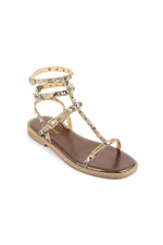 Studded gladiator sandals in beige faux leather - Image n°1