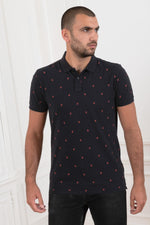 Men's navy blue polo shirt with red patterns - Image n°1