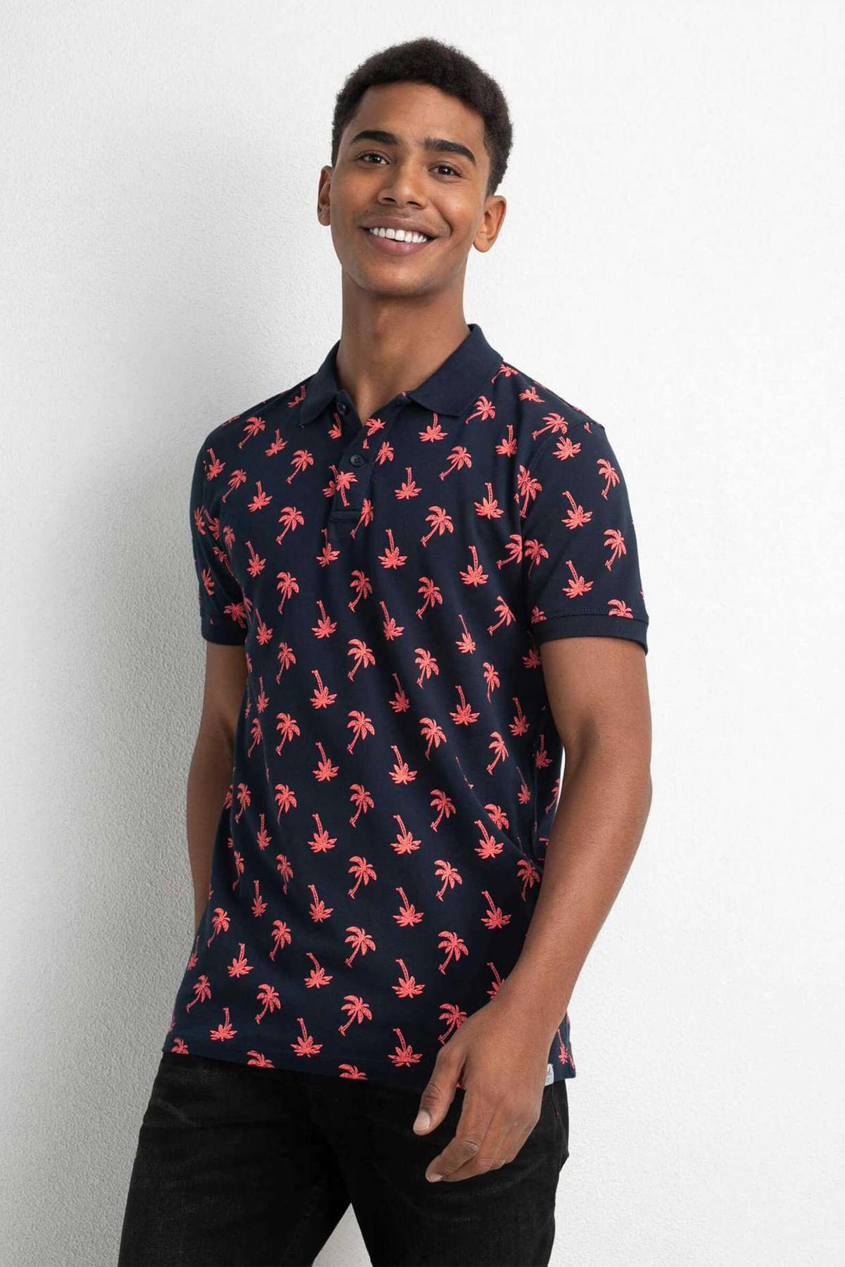 Men's navy blue all-over palm print polo shirt - Image n°1