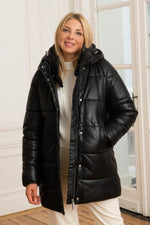 Oakwood's matte black sheepskin leather jacket with detachable hood. - Image n°1