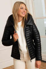 Quilted lambskin jacket in deep black, white zip and statement collar. - Image n°5