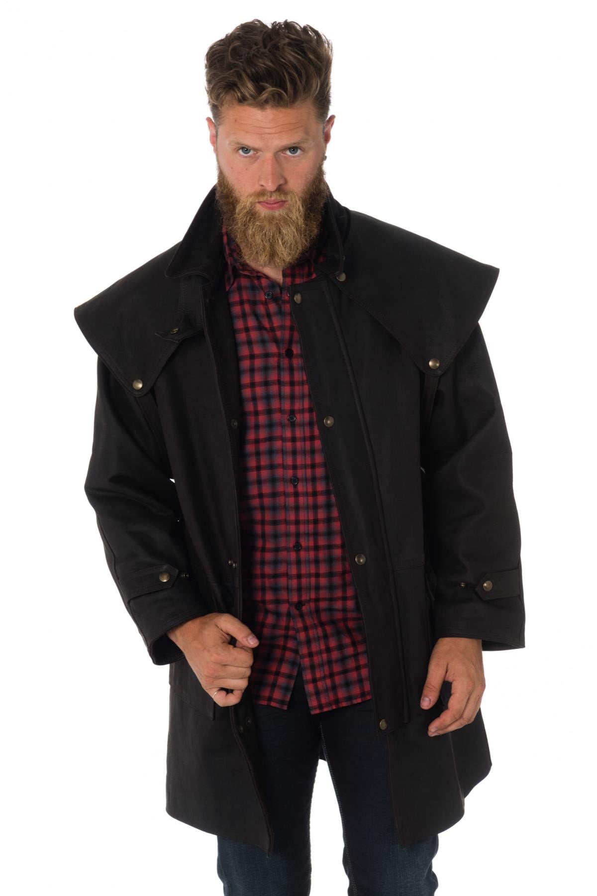 Durable buffalo leather coat with a detachable cape and relaxed fit. - Image n°1