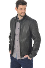 Sleek black lambskin jacket featuring a moto collar and tonal details. - Image n°1
