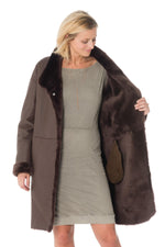 Reversible brown shearling coat-sleek leather or soft fur. - Image n°11