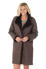 Reversible brown shearling coat-sleek leather or soft fur. - Image n°1