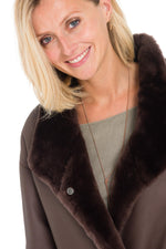 Reversible brown shearling coat-sleek leather or soft fur. - Image n°10