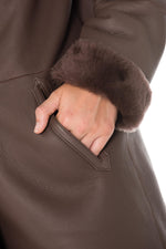 Reversible brown shearling coat-sleek leather or soft fur. - Image n°12