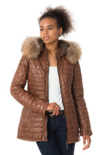 Quilted shearling in aged cognac, lightweight yet warm for winter. - Image n°1