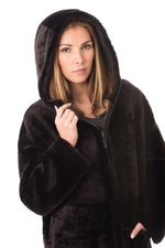 Reversible lambshearling coat in burnished brown-warmth and style. - Image n°9