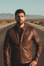 Brandy-hued grained cowhide jacket with quilted biker detailing. - Image n°1