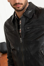 Black lambskin jacket with a soft, vintage patina and slim fit. - Image n°7