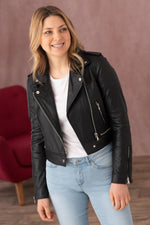 Cropped lambskin jacket with asymmetric zip and snap details for edge. - Image n°1