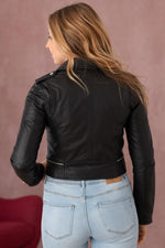 Cropped lambskin jacket with asymmetric zip and snap details for edge. - Image n°7