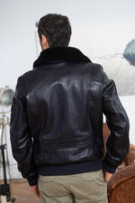 Limited-edition navy lambskin aviator jacket with patinated finish. - Image n°13