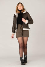 Dark brown sheepskin bomber by Schott. Warm, textured, slim-fit. - Image n°2