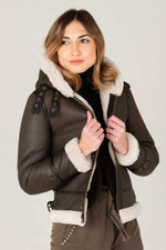 Dark brown sheepskin bomber by Schott. Warm, textured, slim-fit. - Image n°1