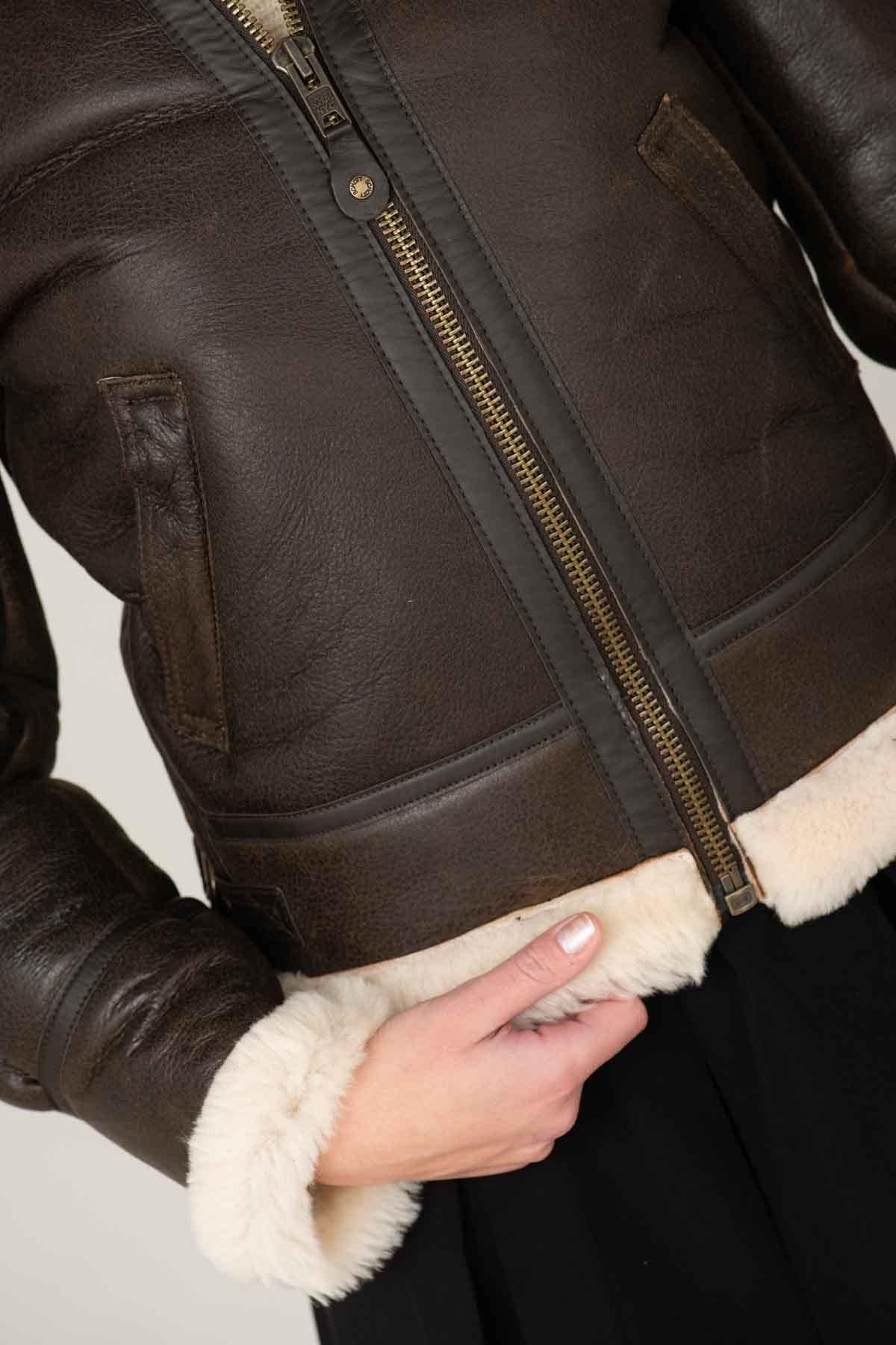 Dark brown sheepskin bomber by Schott, lined with wool for winter. - Image n°3