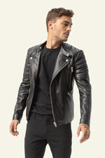 Slim-fit black lambskin biker jacket with matelassage shoulders. - Image n°1
