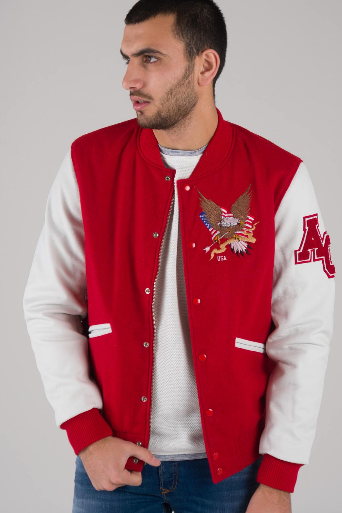Red and white varsity jacket with quilted lining and contrast details. - Image n°1