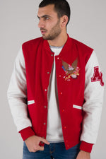 Red and white varsity jacket with quilted lining and contrast details. - Image n°1