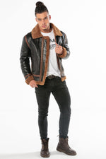 Oiled black sheepskin bomber with cognac shearling lining. - Image n°2