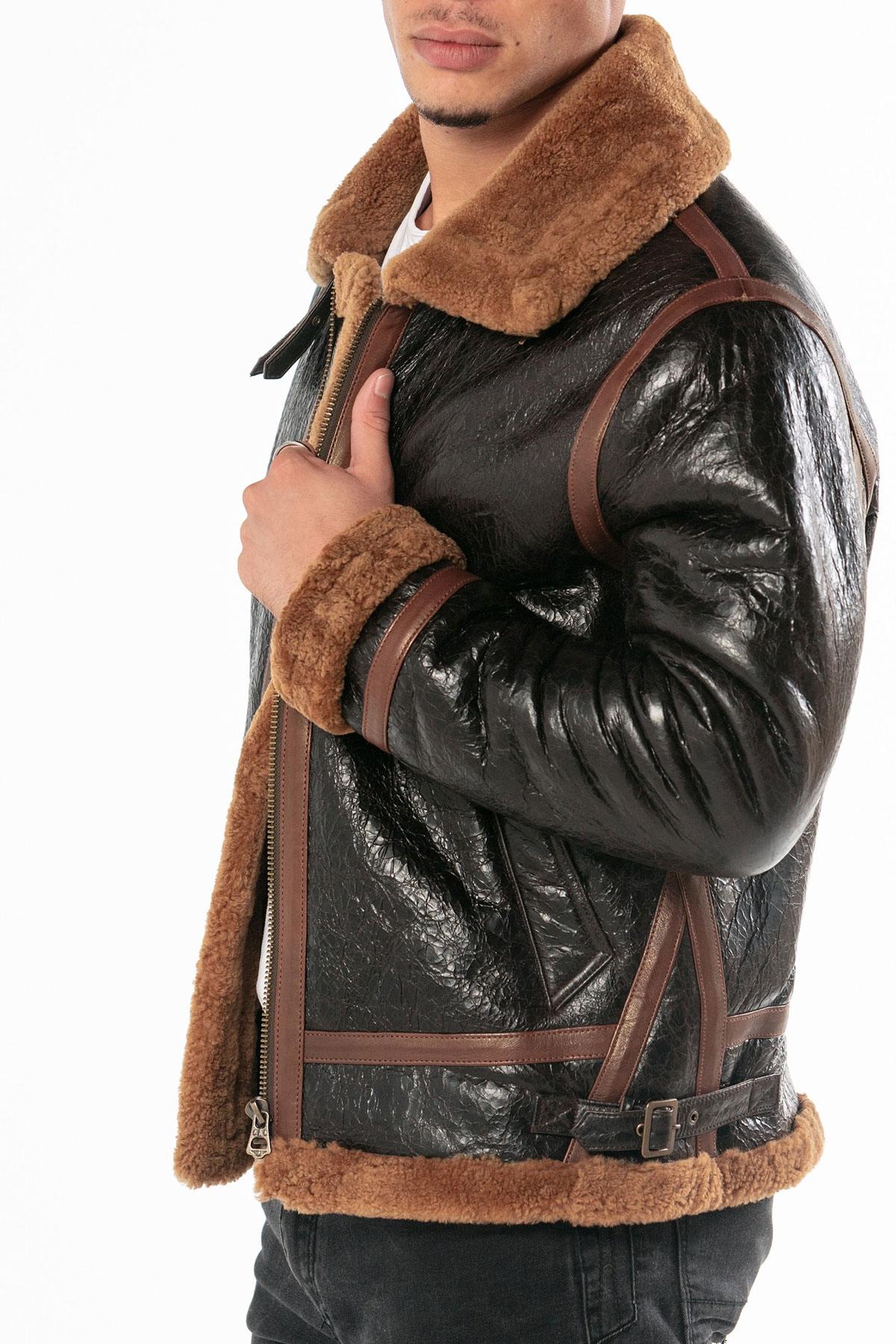 Oiled black sheepskin bomber with cognac shearling lining. - Image n°3