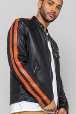 Black lambskin biker jacket with bold orange accents. Slim and sharp. - Image n°5
