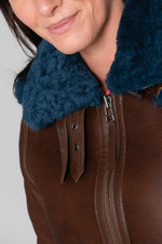 Bomber jacket in brown leather and blue fur - Image n°3