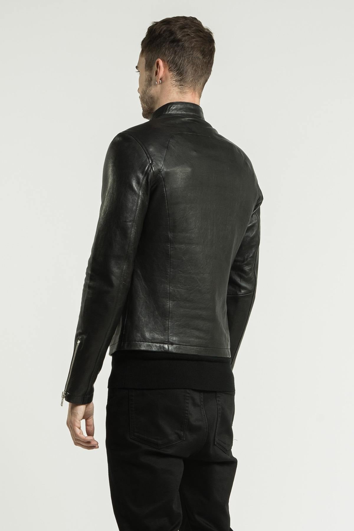 Black lambskin jacket with a semi-matte finish and silver zips. - Image n°10