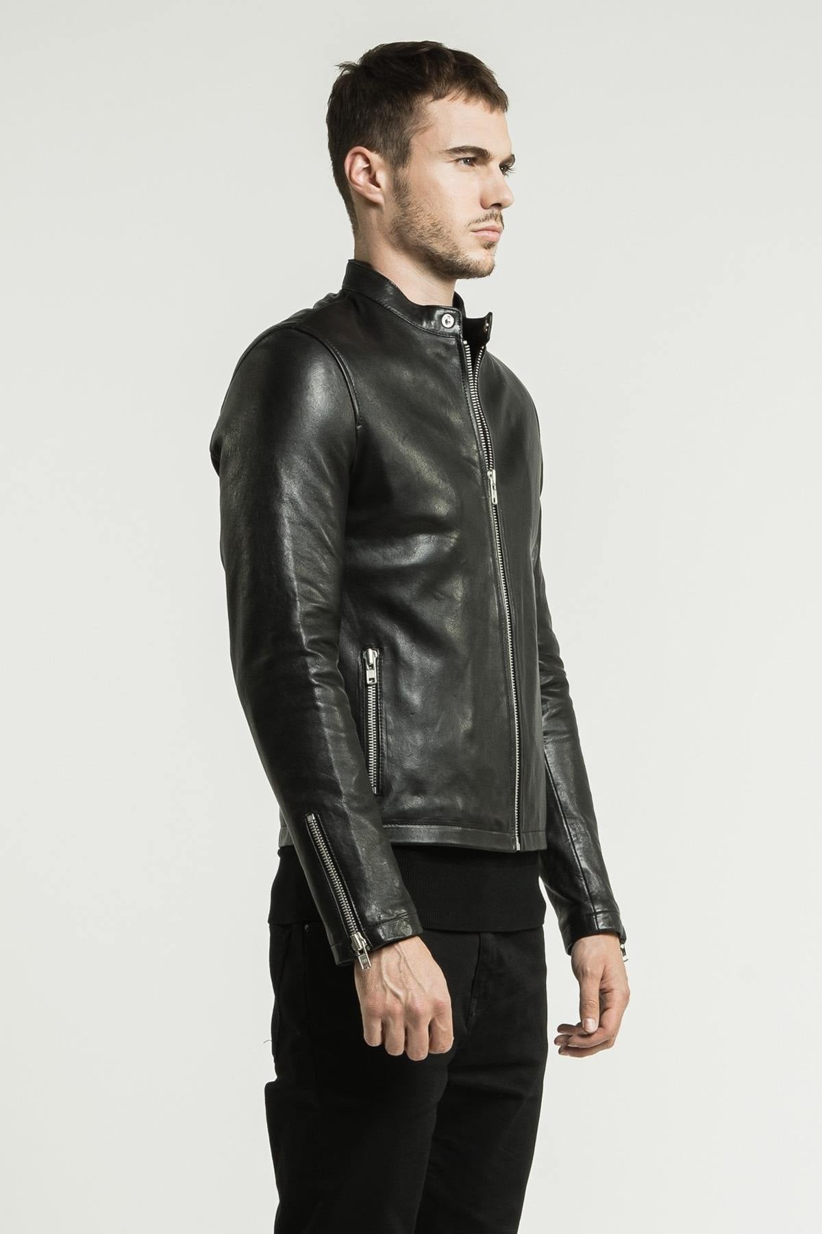 Black lambskin jacket with a semi-matte finish and silver zips. - Image n°9