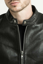 Black lambskin jacket with a semi-matte finish and silver zips. - Image n°11