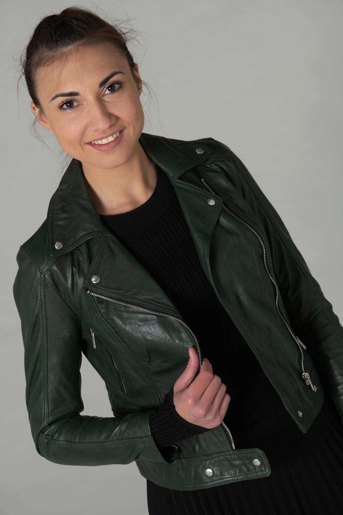 Fitted dark green lambskin jacket. Ultra-feminine with a biker edge. - Image n°1