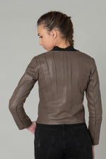 Slim taupe lambskin jacket with textured stitching for urban chic. - Image n°2