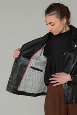 Curve-fit black sheep leather biker jacket with metallic zips. - Image n°4