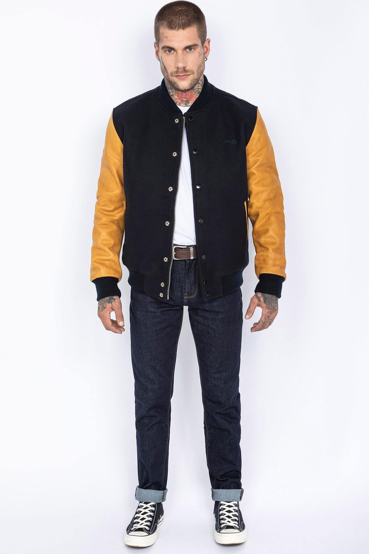 Schott's varsity jacket: navy wool with cognac cowhide sleeves. - Image n°3