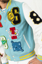 University teddy in white leather and sky blue textile - Image n°6