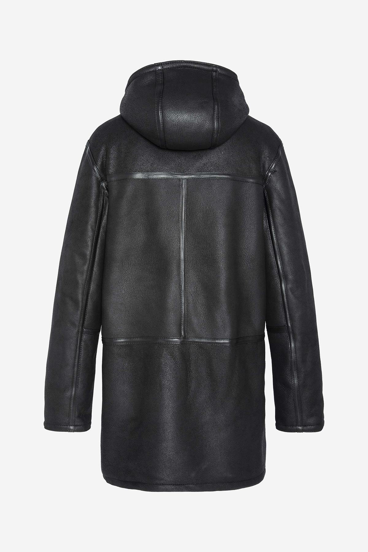 Schott's black shearling coat: aviator warmth for winter's chill. - Image n°9