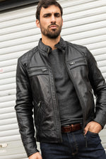 Black lambskin biker jacket, slim fit, matelassé shoulders. - Image n°1