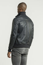 Blue leather jacket with ribbed edges - Image n°3