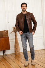 Oiled dark cognac lambskin in a vintage biker cut. Slim, quilted shoulders. - Image n°3