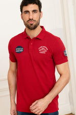 Men's red polo shirt with embroidery - Image n°1