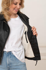 Aged black sheepskin jacket with a biker collar and rock edge. - Image n°7