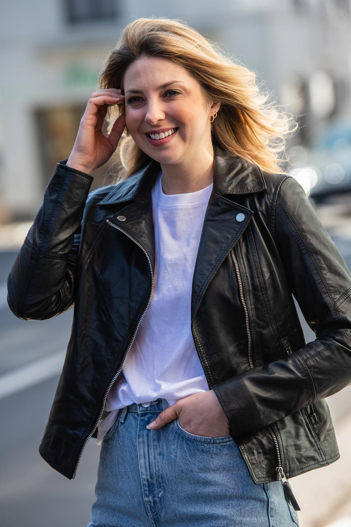 Aged black sheepskin jacket with a biker collar and rock edge. - Image n°1